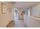 Upstairs hallway with a bench and access to bedrooms at 115 Essex Pl, Davenport, FL 33896