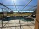 Enjoy the Florida sunshine with this screened-in pool and spa at 115 Essex Pl, Davenport, FL 33896