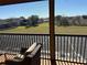 Screened balcony overlooking the backyard and neighboring houses at 115 Essex Pl, Davenport, FL 33896