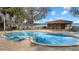 Relaxing kidney-shaped pool with lake views at 1174 Paseo Del Mar # D # 32707, Casselberry, FL 32707