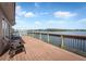 Spacious deck overlooking the lake with chairs at 1174 Paseo Del Mar # D # 32707, Casselberry, FL 32707