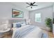 Bright bedroom with a comfortable bed and stylish decor at 118 River Ln, Ormond Beach, FL 32176