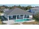 Single story home with private pool and patio area at 118 River Ln, Ormond Beach, FL 32176