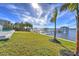 Landscaped lawn offering stunning water views at 118 River Ln, Ormond Beach, FL 32176