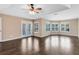 Large bedroom with ceiling fan and lots of windows for ample natural light at 13132 Coldwater Loop, Clermont, FL 34711