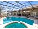 Large pool with spacious patio and screened enclosure at 13132 Coldwater Loop, Clermont, FL 34711