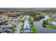 Aerial view of the house, highlighting its location by the lake at 13656 Crystal River Dr, Orlando, FL 32828