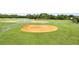 Well-maintained baseball field for community use at 13656 Crystal River Dr, Orlando, FL 32828