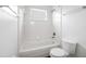 Simple bathroom with white tile and a shower/tub combo at 13656 Crystal River Dr, Orlando, FL 32828