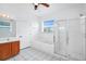 Bright bathroom with soaking tub, shower, and updated vanity at 13656 Crystal River Dr, Orlando, FL 32828