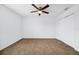 Large bedroom with double door closet and brown carpet at 13656 Crystal River Dr, Orlando, FL 32828