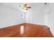 Spacious bedroom with wood floors and ample natural light at 13656 Crystal River Dr, Orlando, FL 32828