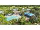 Resort-style pool with a playground and shaded areas at 13656 Crystal River Dr, Orlando, FL 32828