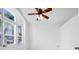 Bright living room with ceiling fan and large windows at 13656 Crystal River Dr, Orlando, FL 32828