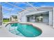 Inviting kidney-shaped pool with screened patio at 13656 Crystal River Dr, Orlando, FL 32828