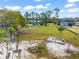 Lakefront property with large lot and mature trees at 14415 Lake Huckleberry Ln, Winter Garden, FL 34787