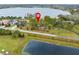 Aerial view showing waterfront lot location at 14415 Lake Huckleberry Ln, Winter Garden, FL 34787