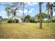 Single-story home with large yard and mature trees at 14415 Lake Huckleberry Ln, Winter Garden, FL 34787