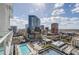 Aerial city view with pool and tennis court at 150 E Robinson St # 1410, Orlando, FL 32801