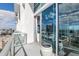 Private balcony with glass railings and city views at 150 E Robinson St # 1410, Orlando, FL 32801