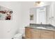 Modern bathroom with granite vanity and updated fixtures at 150 E Robinson St # 1410, Orlando, FL 32801