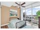 Bedroom with city views and ceiling fan at 150 E Robinson St # 1410, Orlando, FL 32801