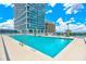 Relaxing rooftop pool with lounge chairs and city views at 150 E Robinson St # 1410, Orlando, FL 32801