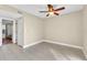 Spacious bedroom with tile floors and neutral wall color at 174 Northshore Cir, Casselberry, FL 32707