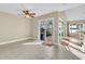 Bright dining room with tile floors and sliding doors to patio at 174 Northshore Cir, Casselberry, FL 32707