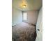 Spacious bedroom with carpeted floor and window coverings at 196 Westmoreland Cir, Kissimmee, FL 34744