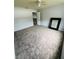 Bedroom with ceiling fan and carpeted floor at 196 Westmoreland Cir, Kissimmee, FL 34744