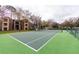 Apartment tennis court offers a recreational amenity for residents and adds an element of active living to the community at 2302 Midtown Ter # 1228, Orlando, FL 32839