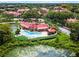 Community pool and clubhouse with tennis courts and a lake at 236 Afton Sq # 103, Altamonte Springs, FL 32714