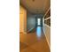 Bright hallway with tile flooring and built-in shelving at 2408 Addison Creek Dr, Kissimmee, FL 34758