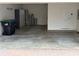 Spacious two car garage complete with storage, water heater and plenty of extra space at 2530 Domenico Paul Way, Orlando, FL 32810