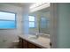 Clean bathroom with a shower/tub combo, vanity, and updated fixtures at 2612 Keswick Ct, Kissimmee, FL 34744