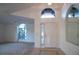 Bright entryway with high ceilings and arch windows at 2612 Keswick Ct, Kissimmee, FL 34744