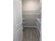 Well-organized pantry with wire shelving, offering ample storage space at 2916 Crest Wave Dr, Clermont, FL 34711