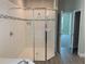 Large walk-in shower with glass enclosure and tile surround at 2916 Crest Wave Dr, Clermont, FL 34711