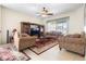 Relaxing living room with two sofas and a large TV at 2920 River Birch Dr, Kissimmee, FL 34741