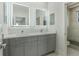 Modern bathroom with double vanity and a walk-in shower at 3015 Kensington Ave, Davenport, FL 33837