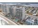 Stunning aerial of oceanfront property, showing building and beach at 3311 S Atlantic Ave # 1402, Daytona Beach, FL 32118