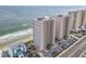 Aerial view of two oceanfront high rises and beach at 3311 S Atlantic Ave # 1402, Daytona Beach, FL 32118