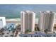 Aerial view of two oceanfront buildings and parking lot at 3311 S Atlantic Ave # 1402, Daytona Beach, FL 32118