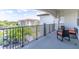 Outdoor balcony with seating area and building views at 4012 Breakview Dr # 405, Orlando, FL 32819