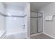 Clean bathroom with a tub and a separate shower at 4012 Breakview Dr # 405, Orlando, FL 32819