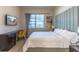 Bedroom with king-size bed, desk, and TV at 4012 Breakview Dr # 405, Orlando, FL 32819