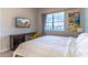 Comfortable bedroom with king-size bed and large window at 4012 Breakview Dr # 405, Orlando, FL 32819