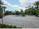 Serene pool and patio area with lush landscaping at 4012 Breakview Dr # 405, Orlando, FL 32819