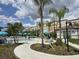 Expansive pool area with lounge chairs and umbrellas at 4012 Breakview Dr # 405, Orlando, FL 32819